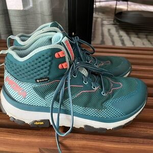Size 9 Hoka high-top trail running / hiking sneakers